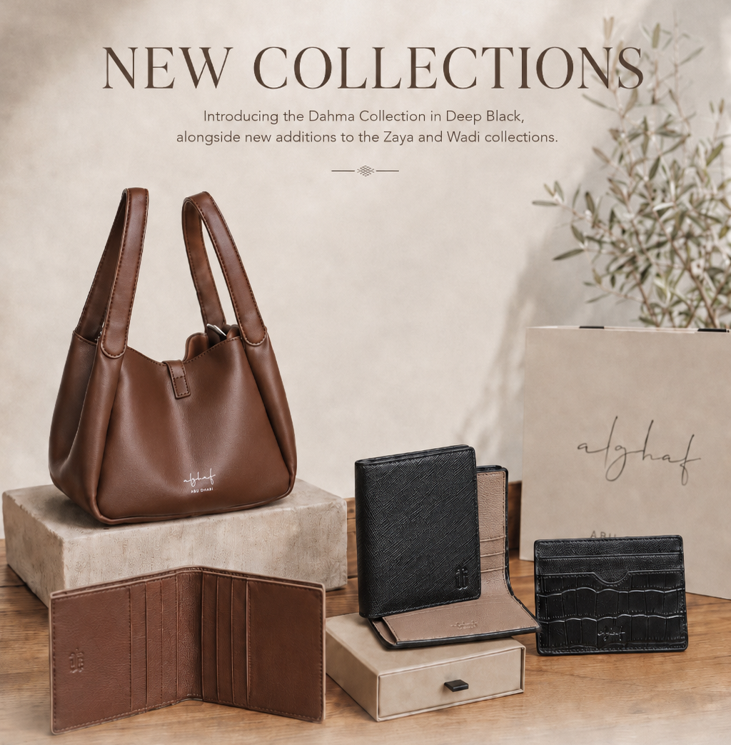 Alghaf brown bag, brown wallet, black wallet and black card holder sitting on alghaf gift box and behind is alghaf beige theme colored paper bag