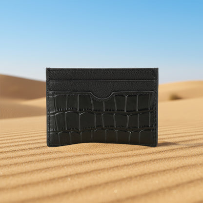 Black crocodile-patterned cardholder on a white background