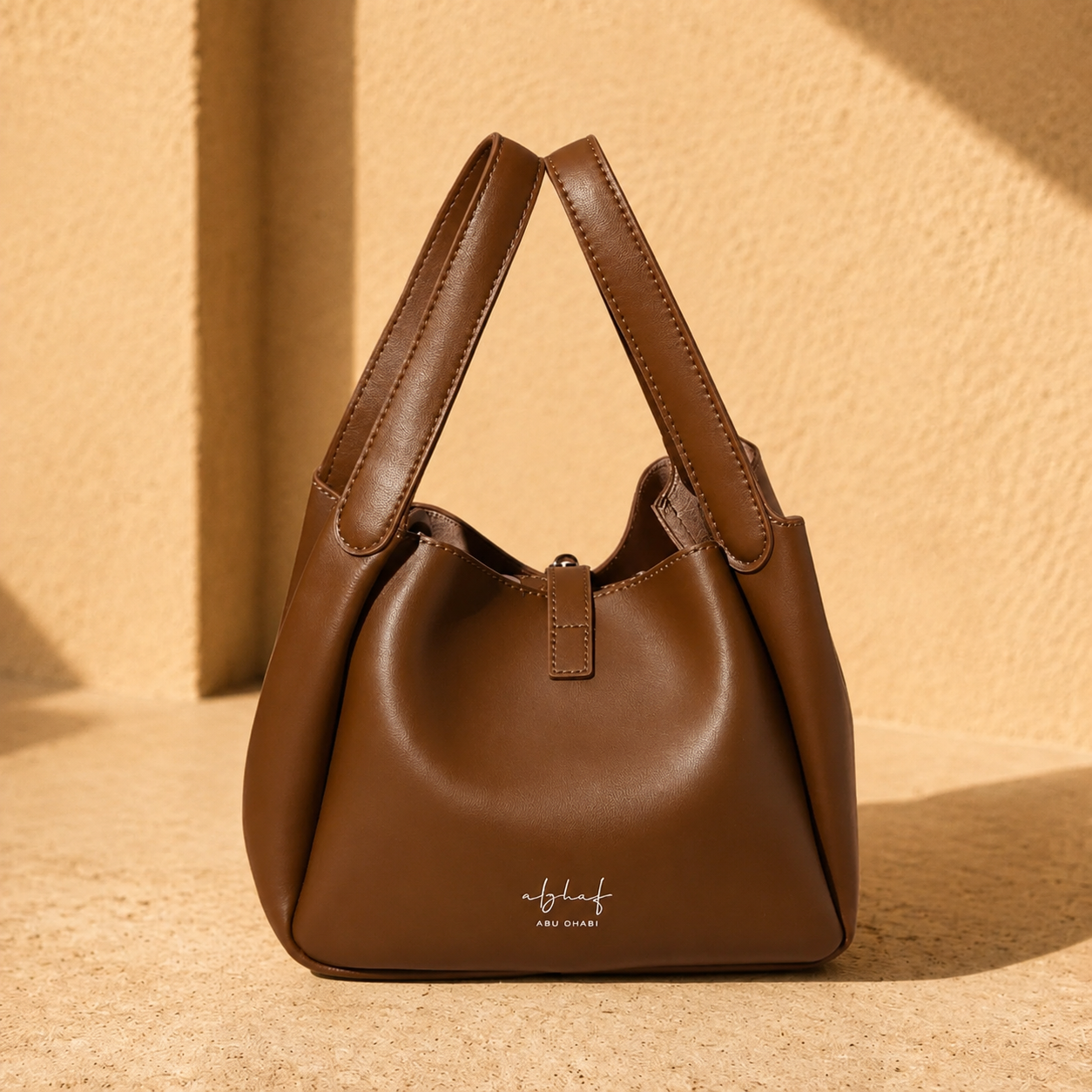Zaya Amber leather handbag, side view, handmade by Alghaf