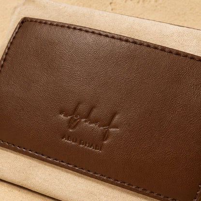 Zaya Amber leather inner pouch with Alghaf logo, handcrafted in Abu Dhabi